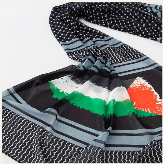 Scarf with geometric patterns and a colorful design on a white background